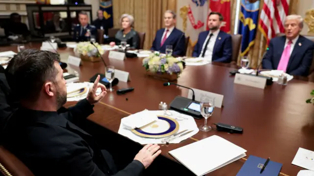 Ukraine's President Volodymyr Zelensky meets with US President Donald Trump over lunch in the Cabinet Room at the White House