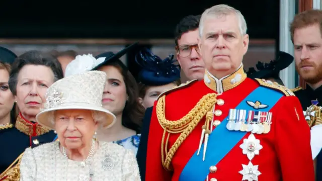 Queen Elizabeth II and Prince Andrew, adorned with medals