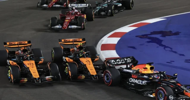 Oscar Piastri. Lando Norris and Max Verstappen during the first-lap incident in Singapore