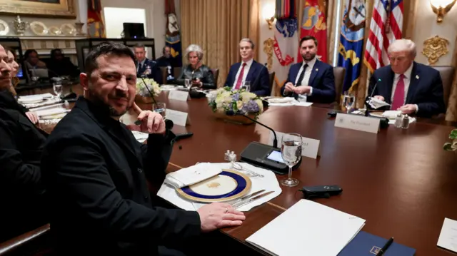 US President Donald Trump meets with Ukraine's President Volodymyr Zelensky in the Cabinet room of the White House