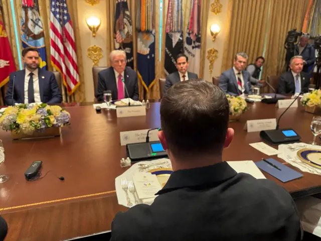 Zelensky and Donald Trump in the cabinet room.