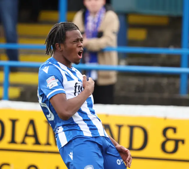 Okoro celebrating