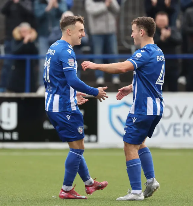 Cooper celebrating his goal