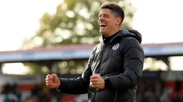 Alex Revell celebrates the win over Luton