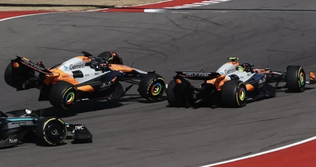 Oscar Piastri's rear wheel goes up in the air on lap one at COTA before hitting Lando Norris