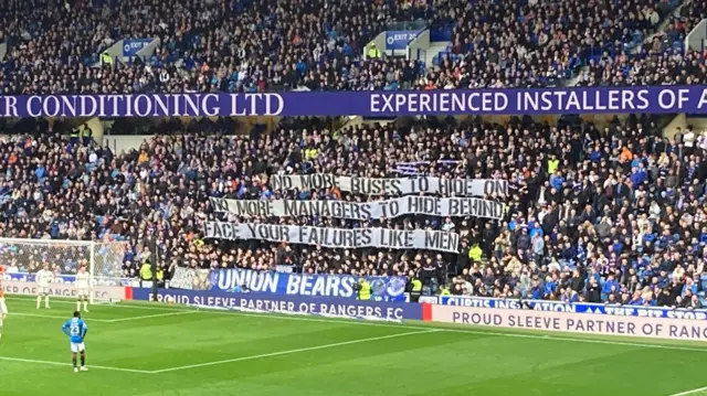 The banners in the Copland Stand read: 'No more buses to hide on. No more managers to hide behind. Face your failures like men.'