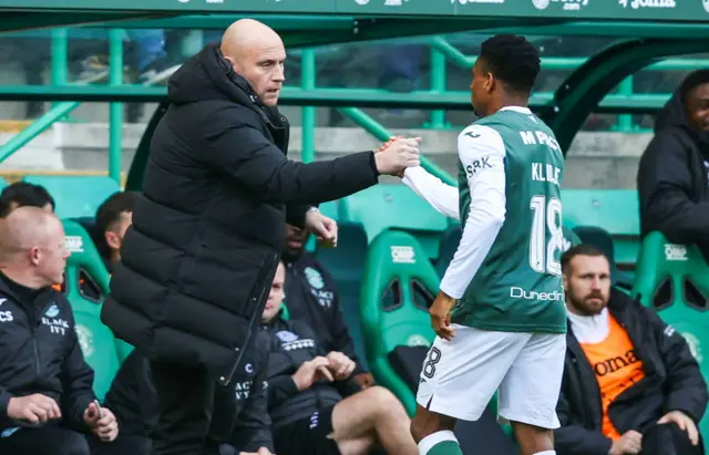 David Gray congratulates goalscorer Thibault Klidje