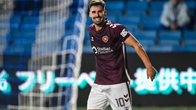 Hearts' Claudio Braga celebrates after scoring to make it 3-0
