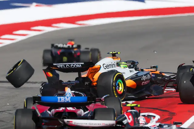 A wheel comes off Oscar Piastri's car during the opening-lap incident at COTA