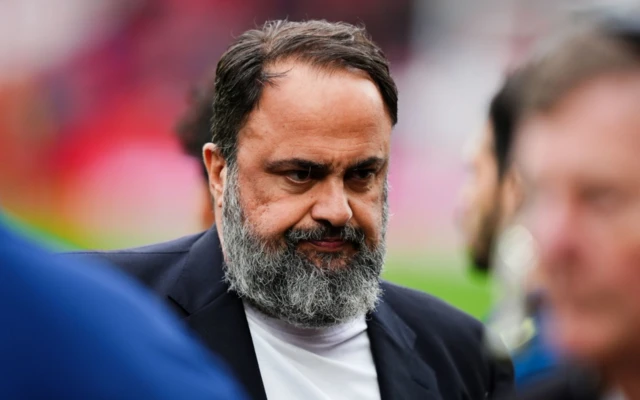 Nottingham Forest owner Evangelos Marinakis looks on