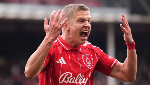 Nottingham Forest's Oleksandr Zinchenko rallies the fans