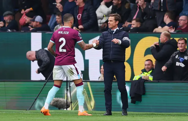 Scott Parker, Manager of Burnley, celebrates with Kyle Walker after their team's second goal