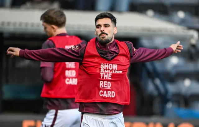 Hearts' Claudio Braga warming up at Rugby Park