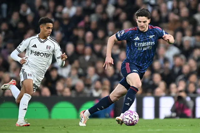 Declan Rice of Arsenal runs with the ball whilst under pressure