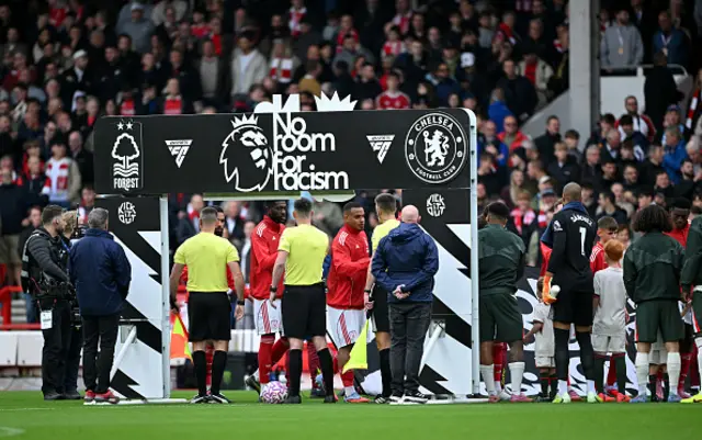 The 'No Room For Racism' handshake board prior to the Premier League match