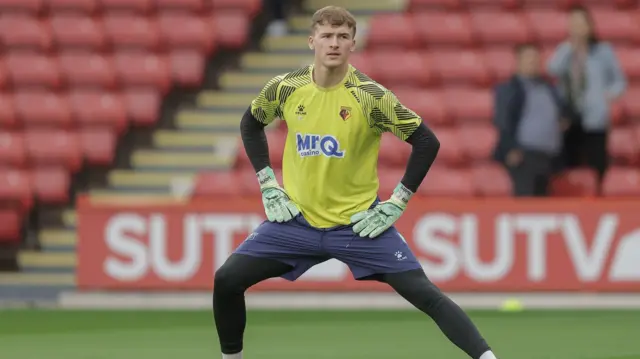 Watford goalkeeper warms up