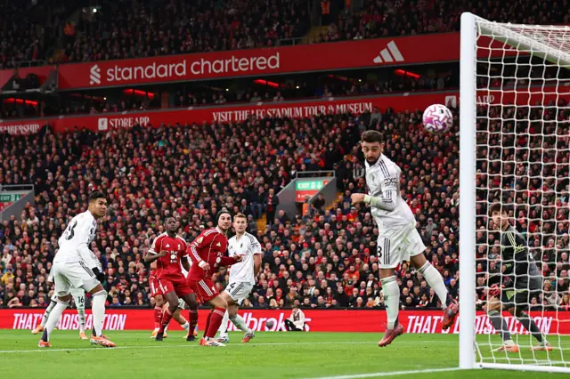 The ball heads for the post after Gakpo shoots at goal