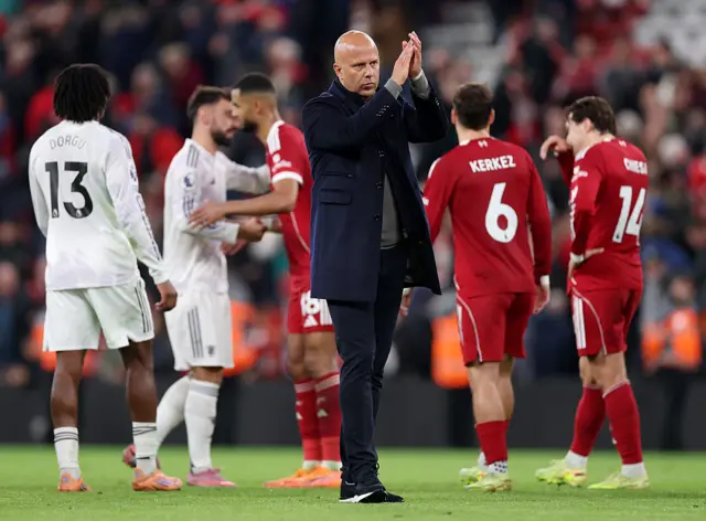 Slot claps the fans at full time