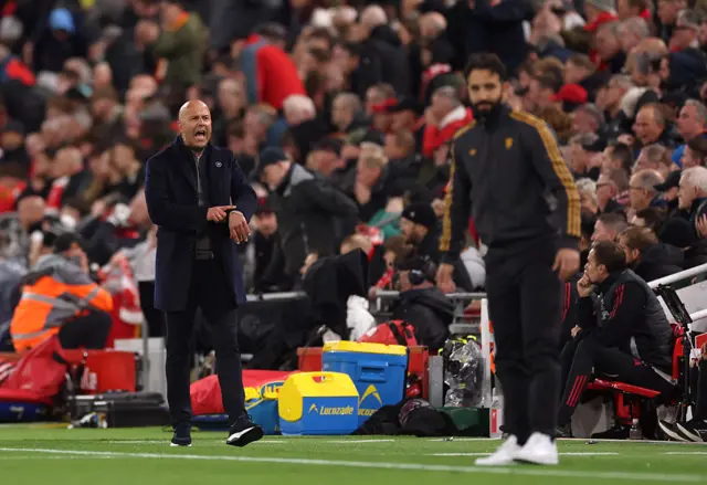 Slot points to his watch as he shouts at the fourth official