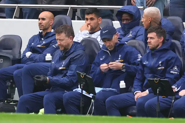 Cristian Romero of Tottenham Hotspur on the substitutes bench