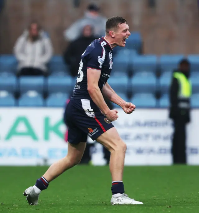 Dundee's Ethan Hamilton celebrates at full-time