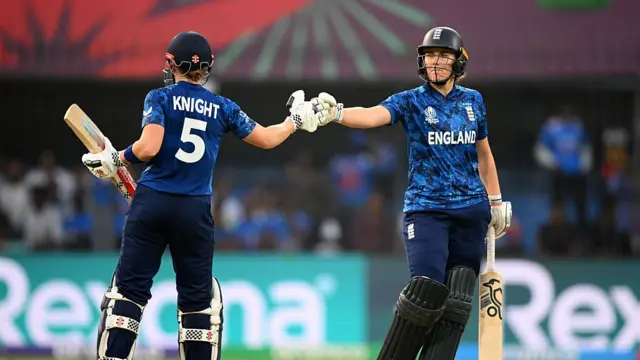 : Heather Knight of England (L) is congratulated by team mate Nat Sciver-Brunt (R)