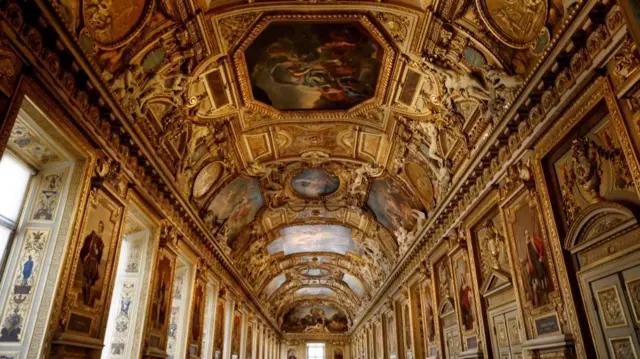 The painted ceilings of Apollo gallery at the Louvre Museum.