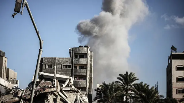 Smoke rises after Israeli airstrike hit al-Bureij camp despite ceasefire in Gaza Strip on October 19, 2025.