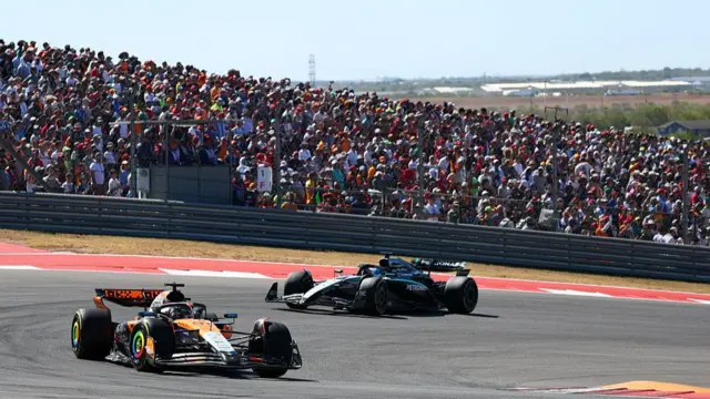 Piastri being chased by Russell