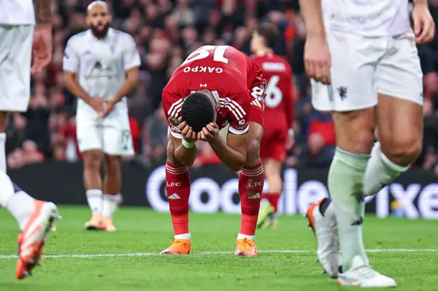 Gakpo holds his head in his hands after a huge miss