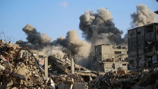Smoke billows following an Israeli strike that targeted a building in the Bureij camp for Palestinian refugees in the central Gaza Strip on October 19, 2025