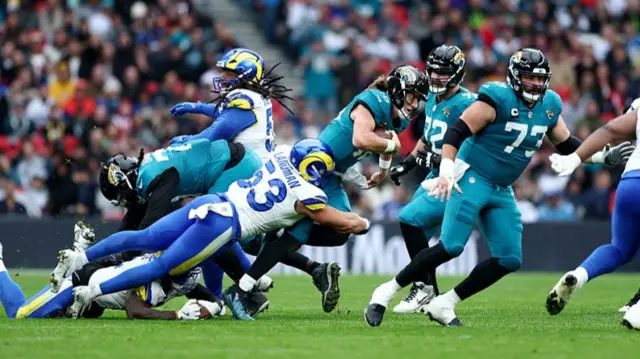 Trevor Lawrence in action during the NFL at Wembley