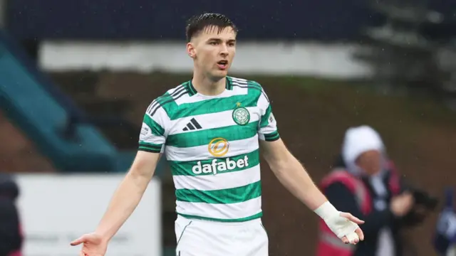 Kieran Tierney with his arms outstretched