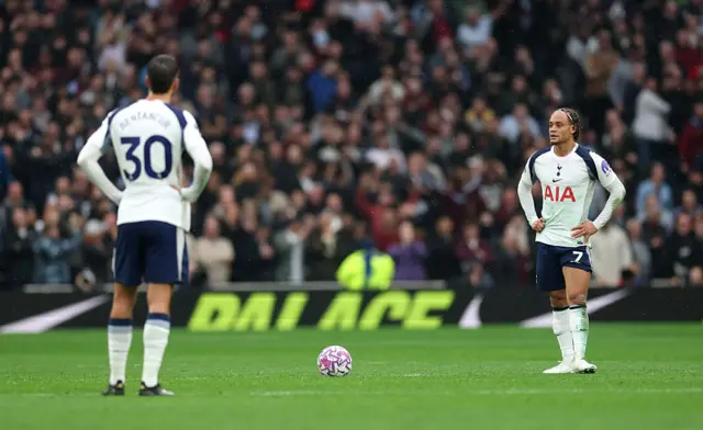 Xavi Simons of Tottenham Hotspur looks dejected