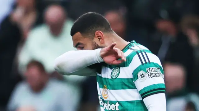 Cameron Carter-Vickers wipes his face