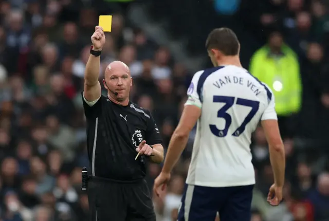 Micky van de Ven receiving a yellow