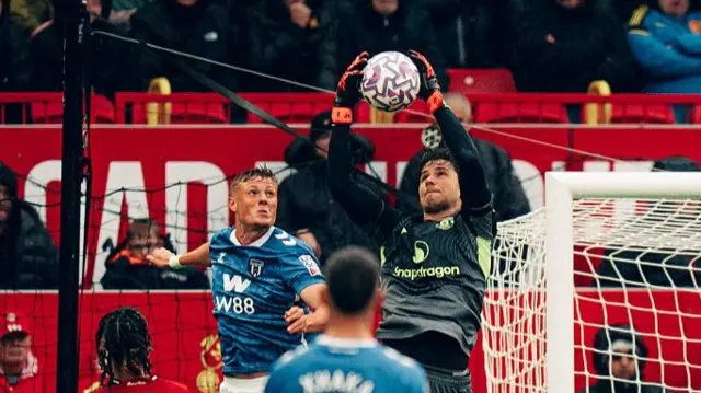 Lammens catches a ball under pressure