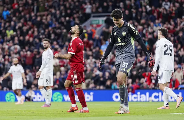 Salah reacts to his big miss as Lammens puffs out his cheeks