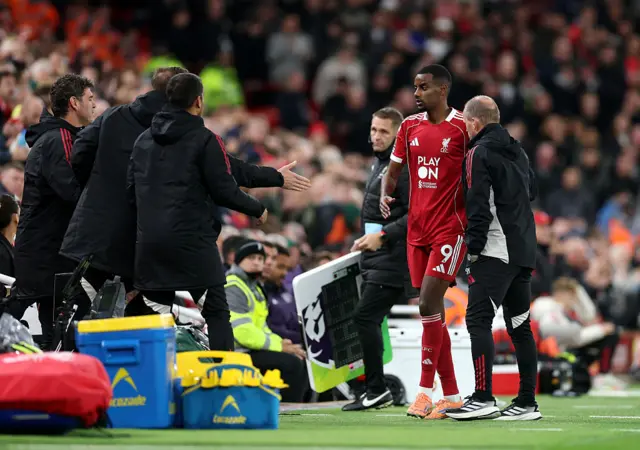 Isak trudges towards the bench