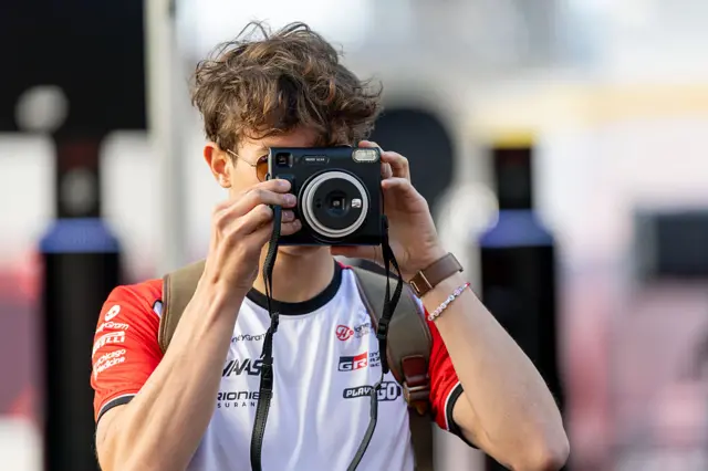 Ollie Bearman takes a picture in the Austin paddock