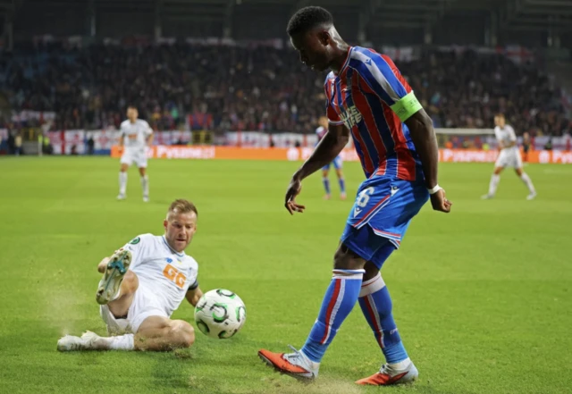 Crystal Palace's Marc Guehi in action with Dynamo Kyiv's Andriy Yarmolenko