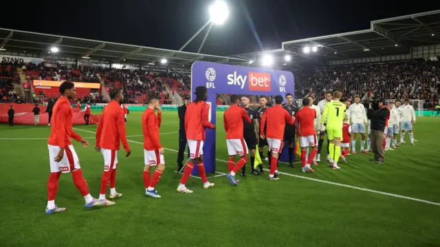 The Rotherham and Bradford players shake hands