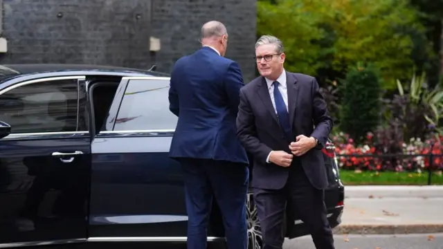 Starmer in Downing Street having just exited from his car