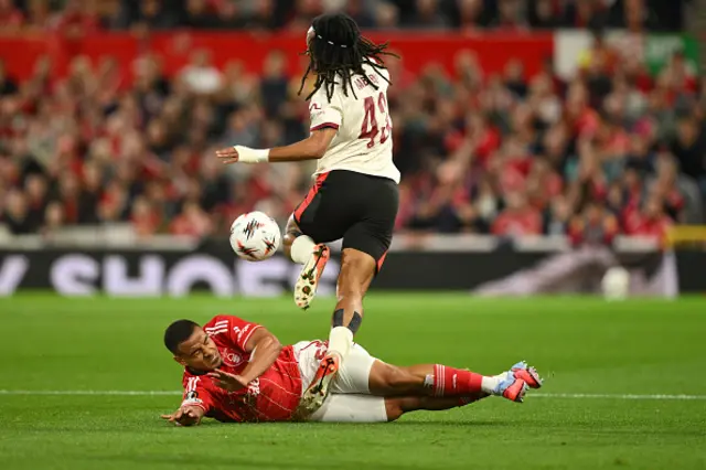 Murillo of Nottingham Forest tackles Kevin Mbabu of FC Midtjylland