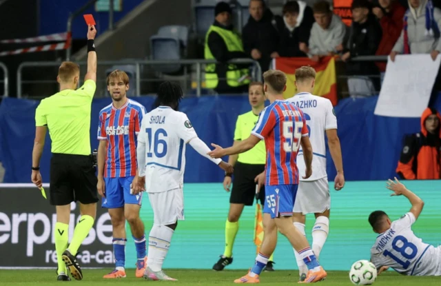 Crystal Palace's Borna Sosa is shown a red card