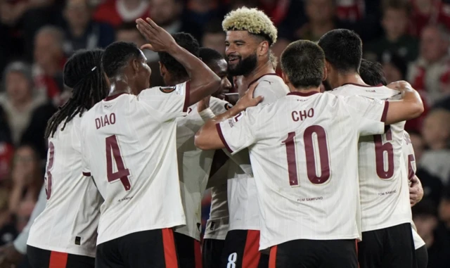 Midtjylland players celebrate after Mads Sorensen (hidden) scores