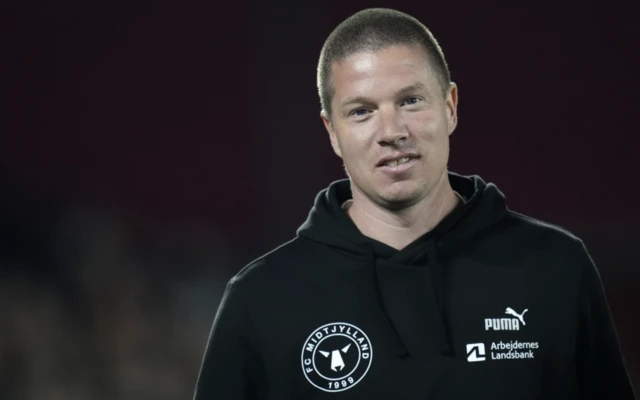 Midtjylland manager Mike Tullberg looks on