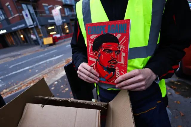 Detail of the match day programme being sold