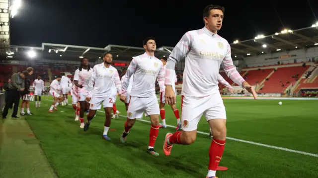 Rotherham players warm up at the New York Stadium