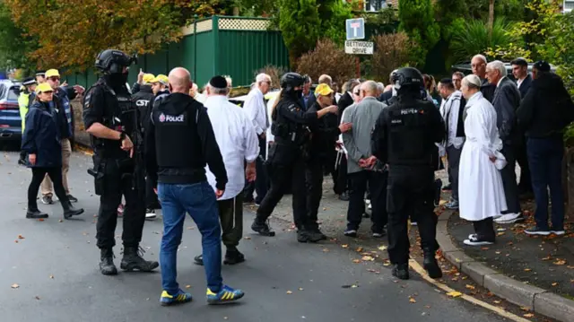 People outside synagogue